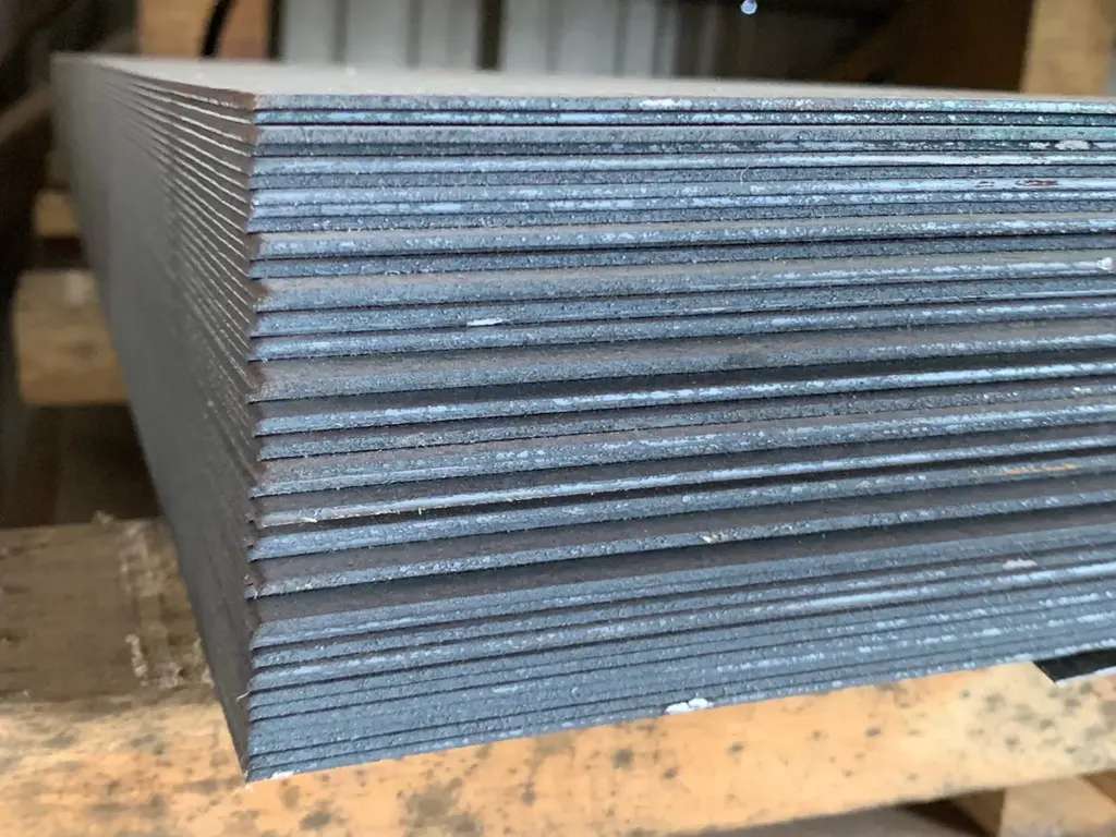 Stacks thin steel plate at Surplus Steel's Apopka, FL yard
