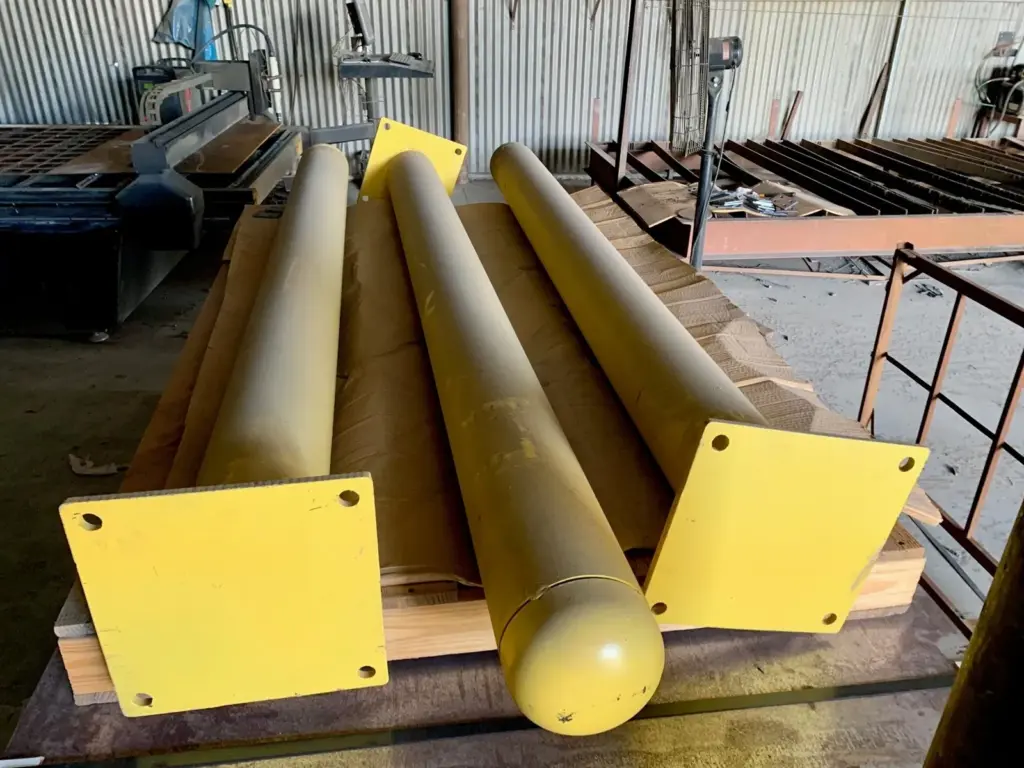 Steel Pipe Bollards 4 Surface-mount steel bollards with base plates welded in house